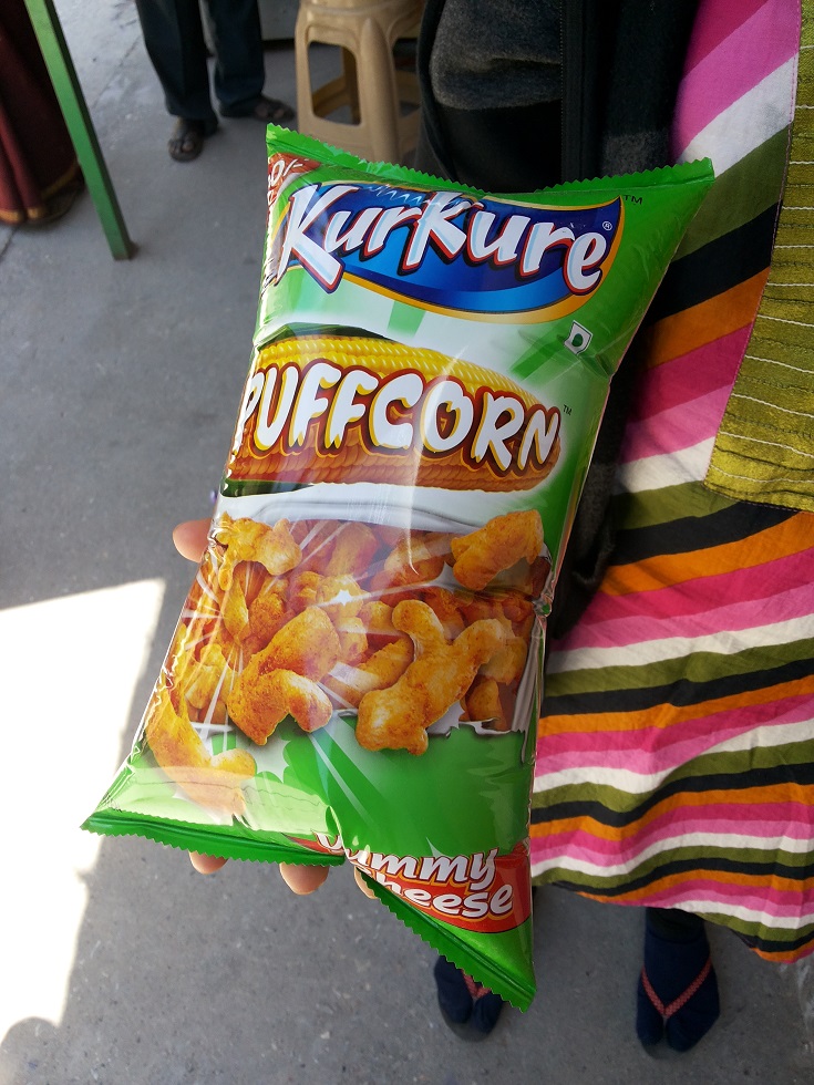 puffed up packet of corn pops