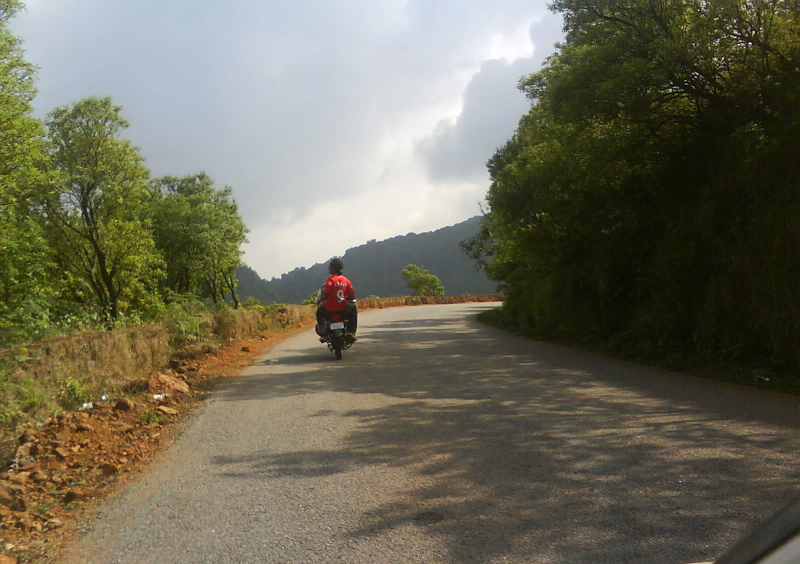 Going on a bike towards Hanumangundi falls