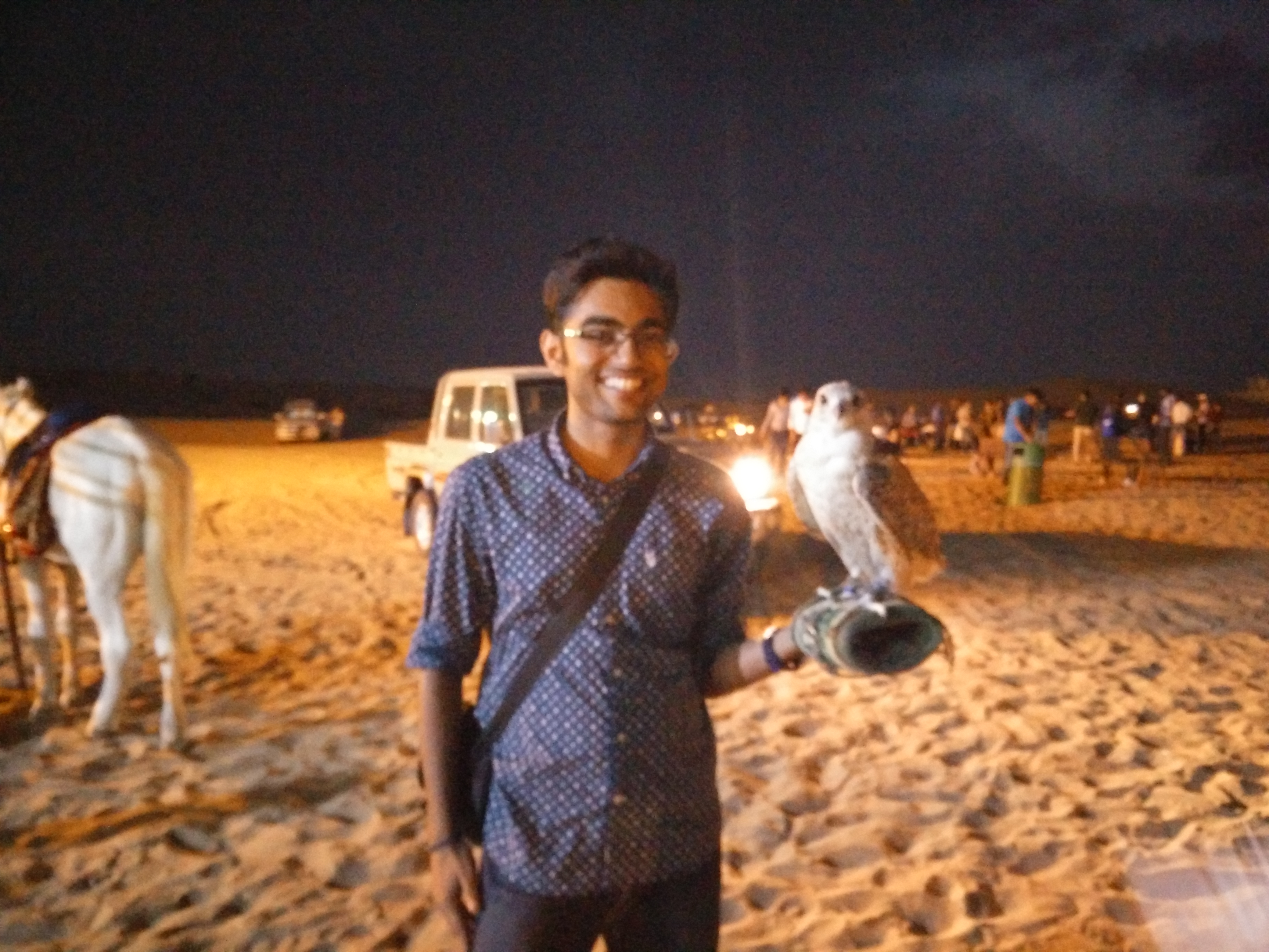 Holding a falcon who was ready to pose