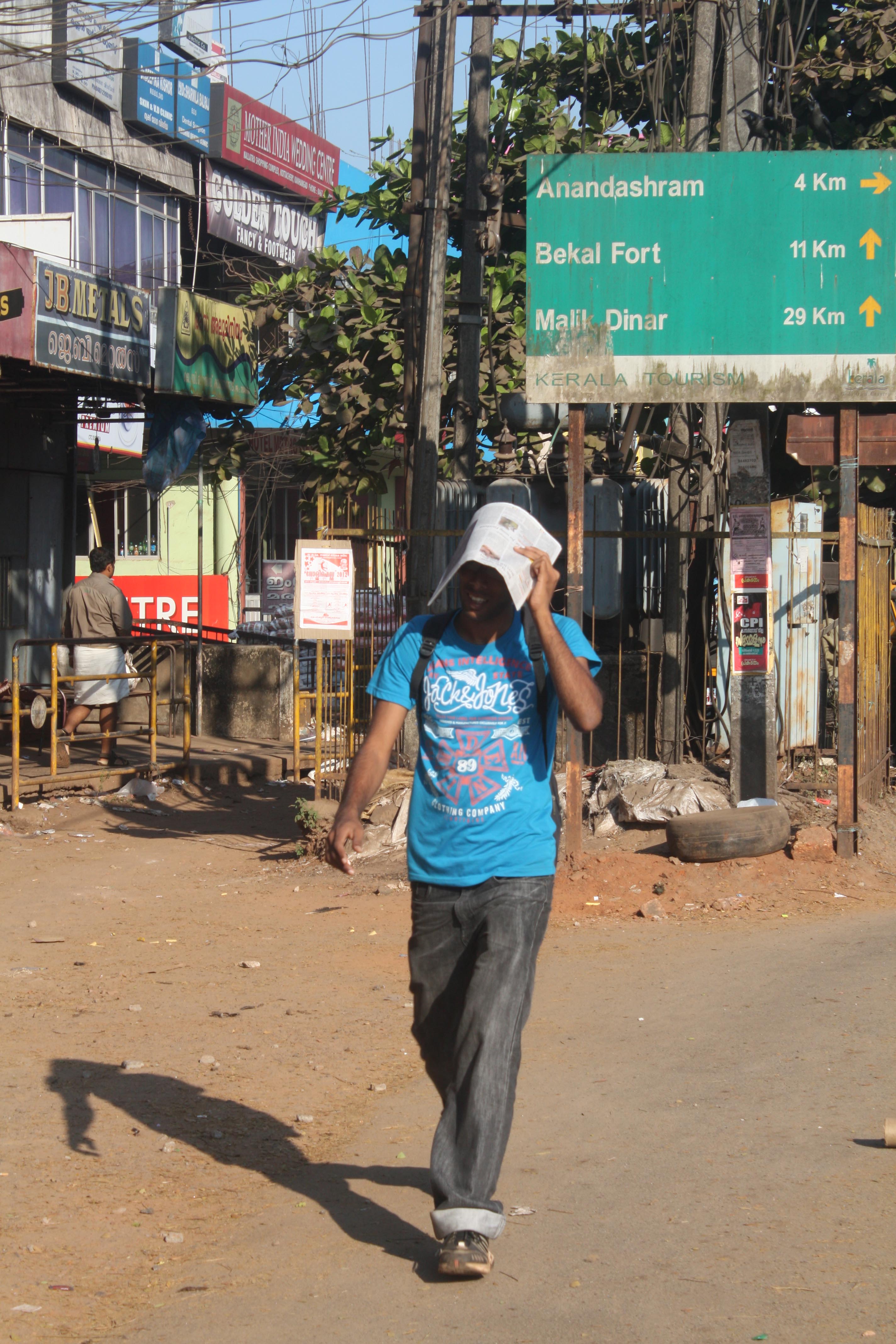 Beating the heat with a newspaper in Kerala