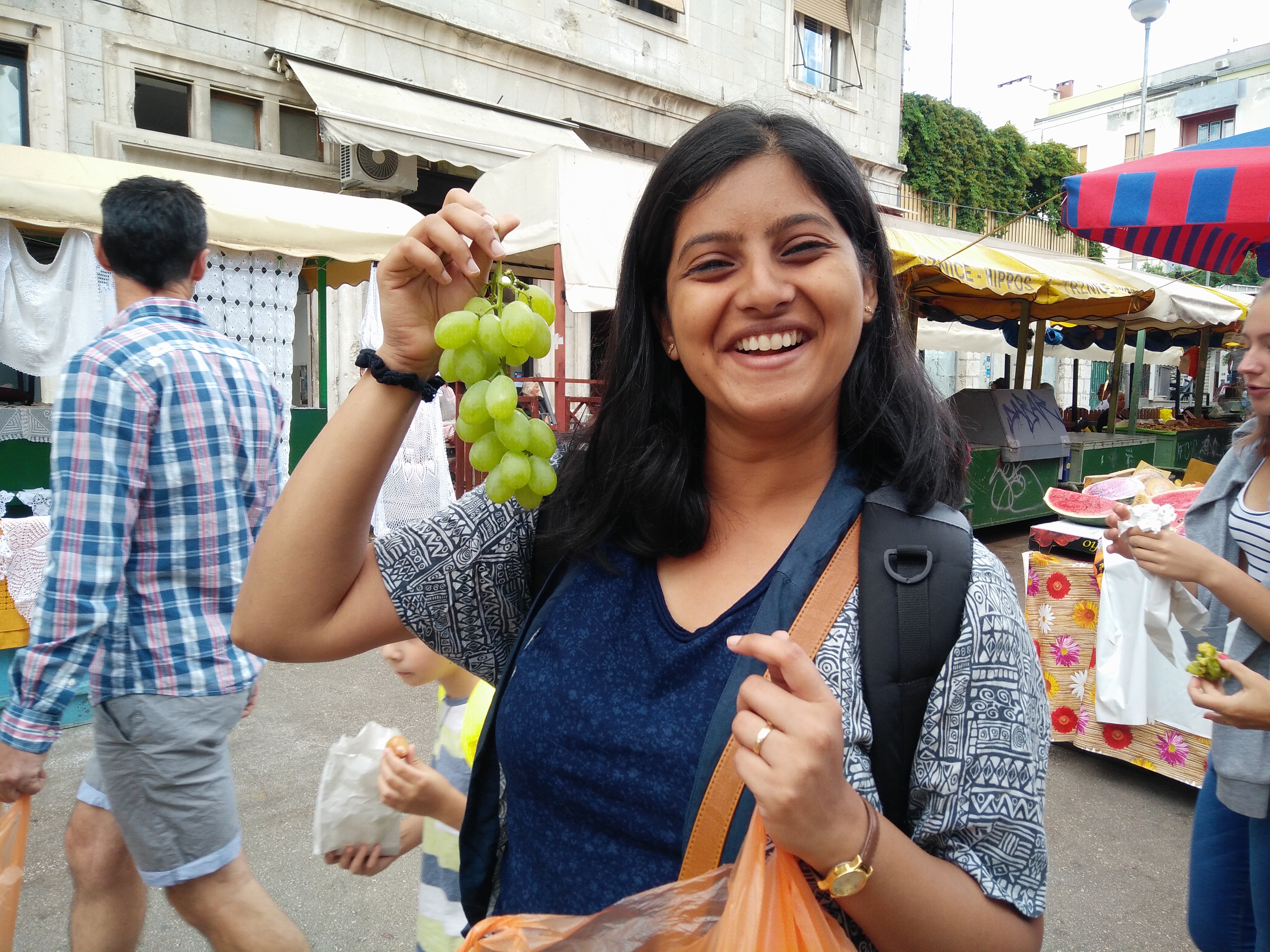 Enjoying fresh grapes in Split Croatia