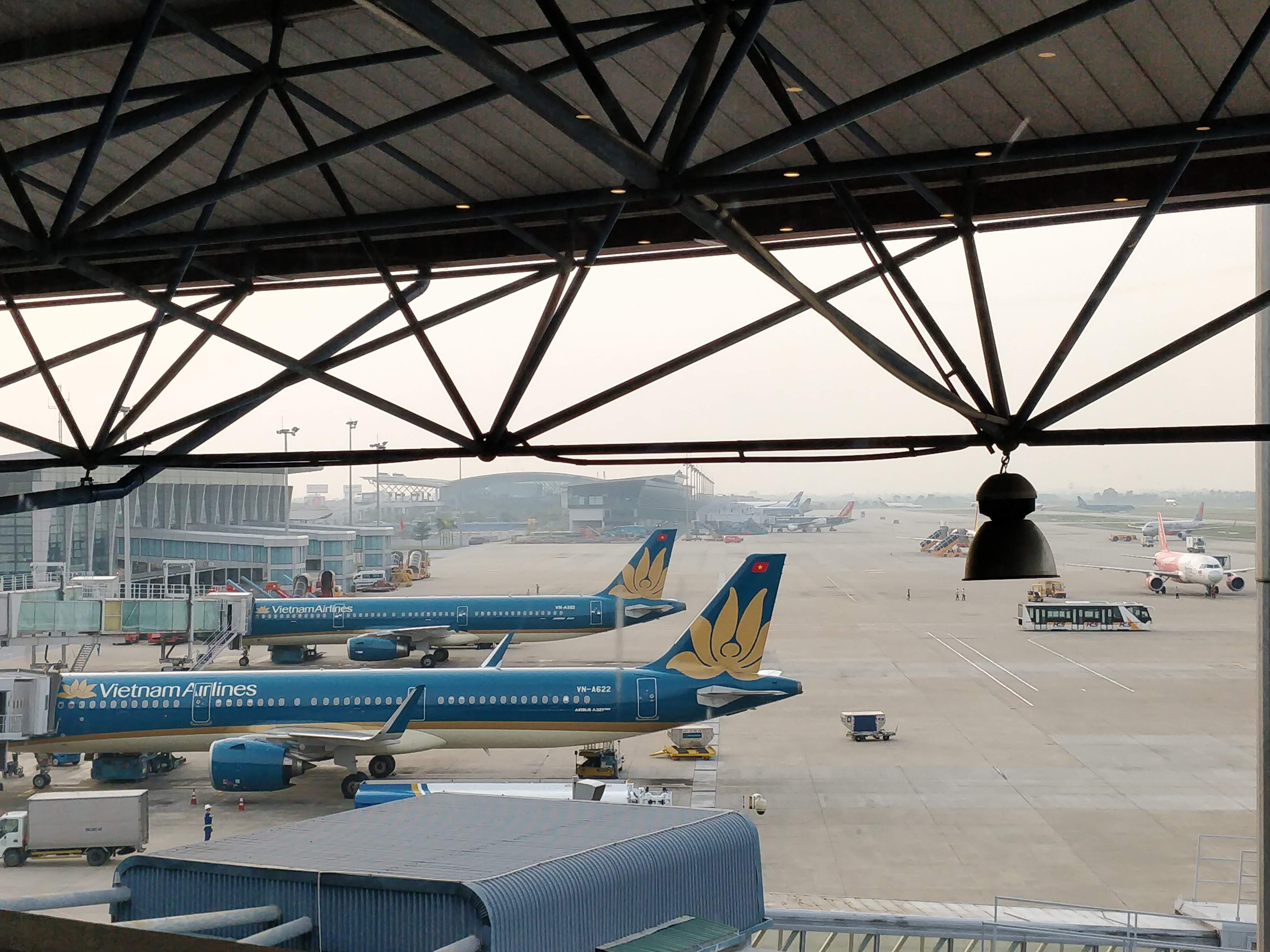 Vietnam airlines planes waiting at Hanoi airport