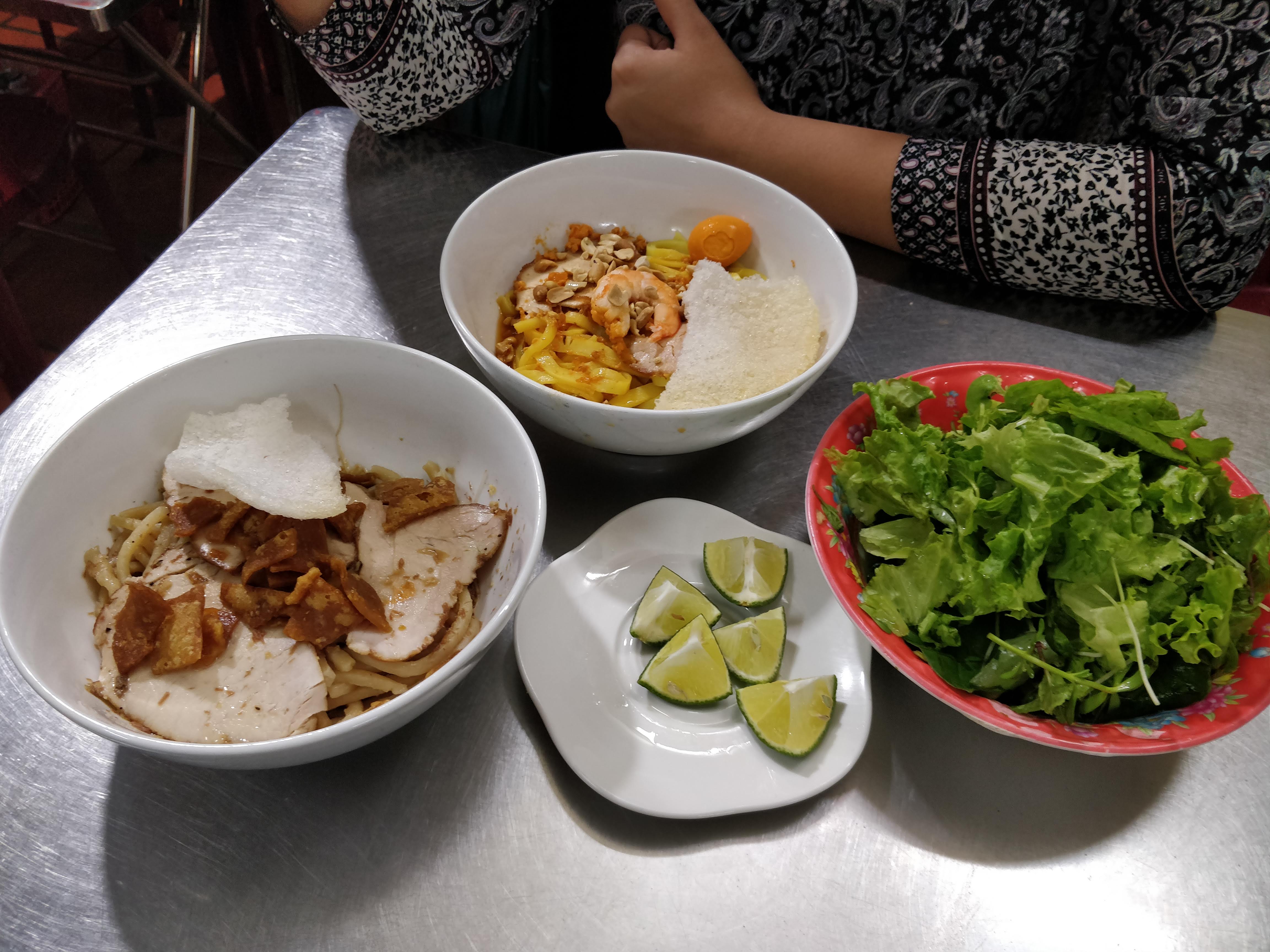Hot bowls of Cau Lau and Mi Quang