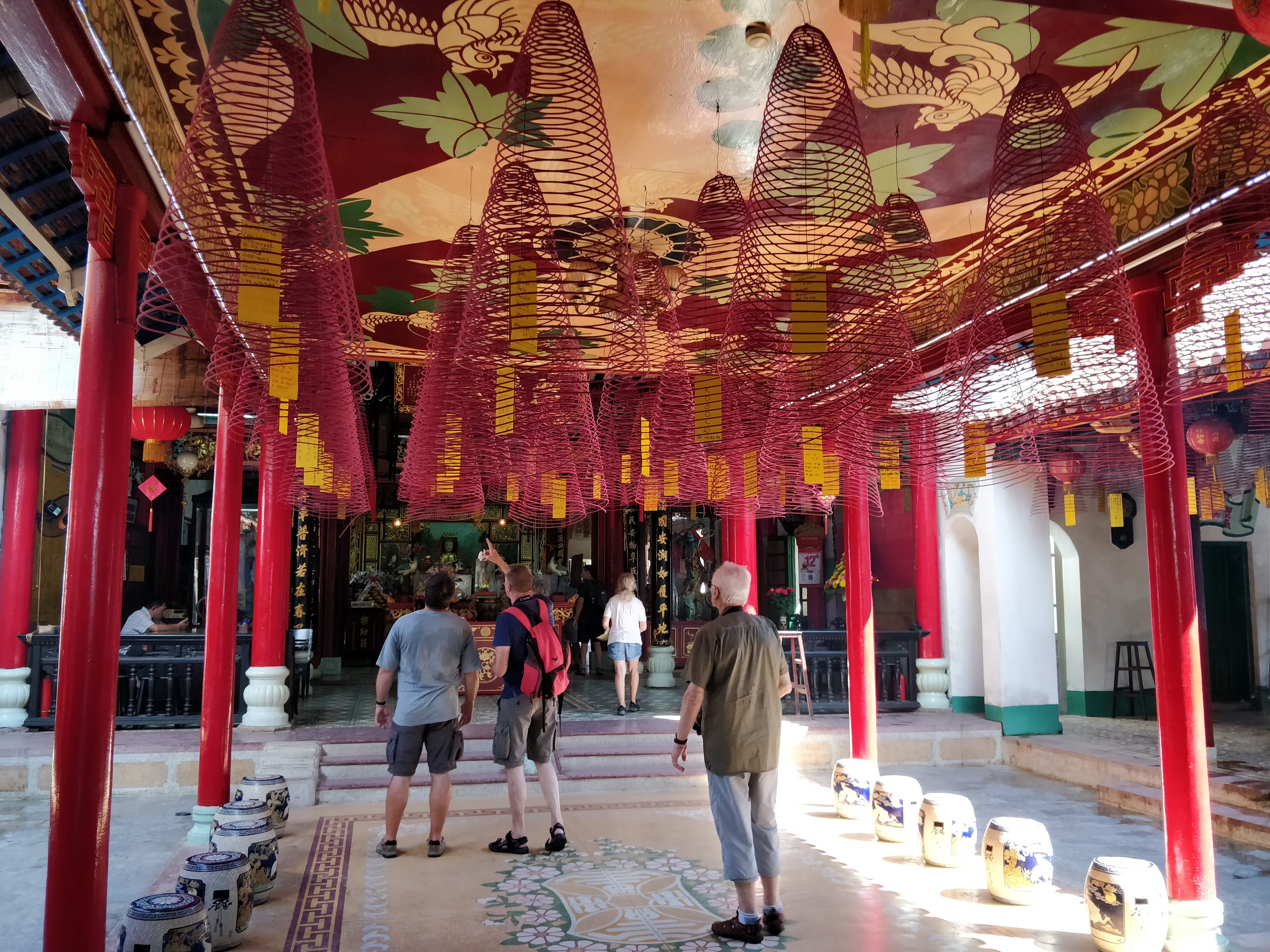 Community hall in Hoi An - the conical stuff hanging from the ceiling is incense!