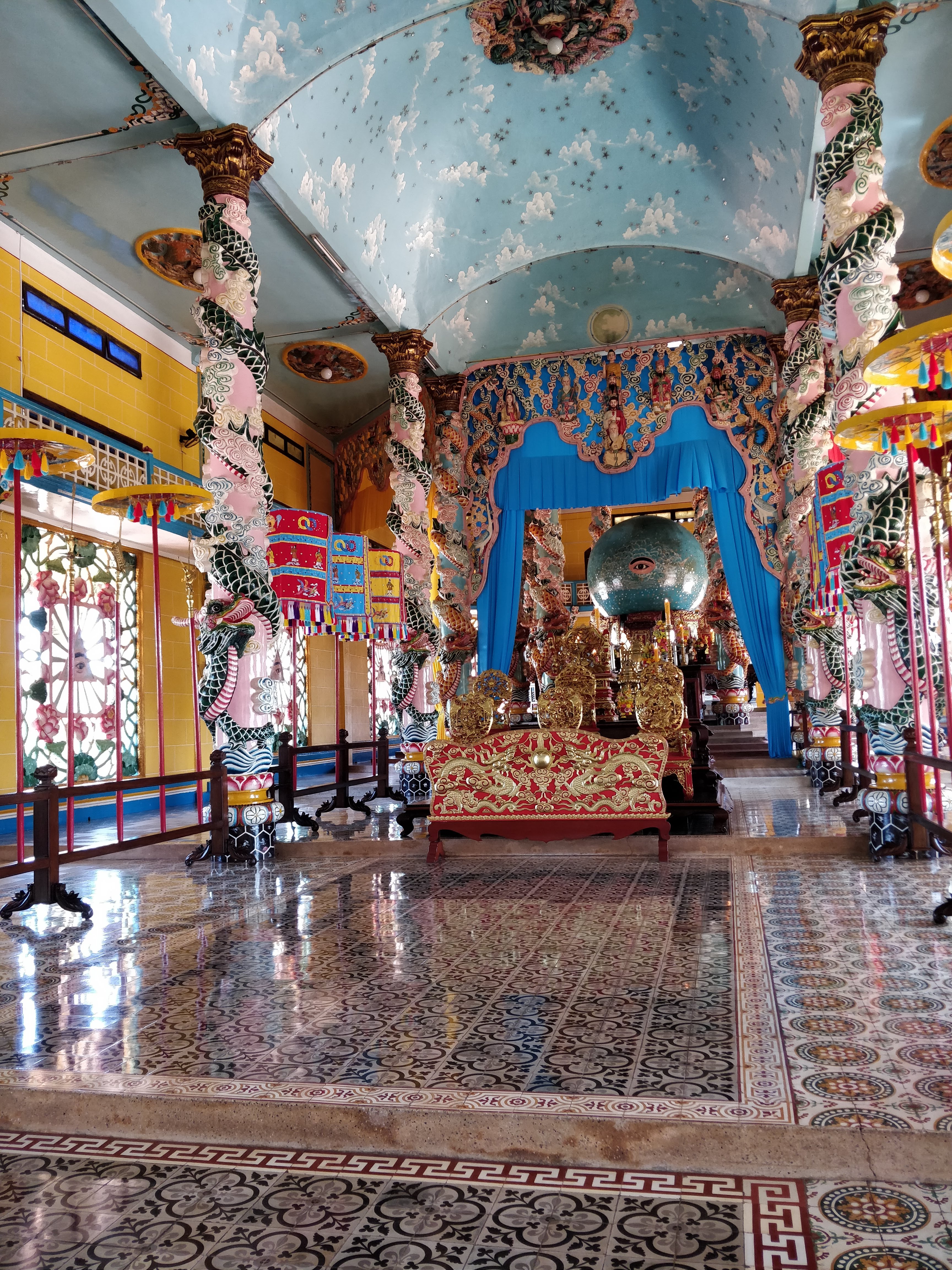 Notice the statues of the great teachers on the back wall near the ceiling