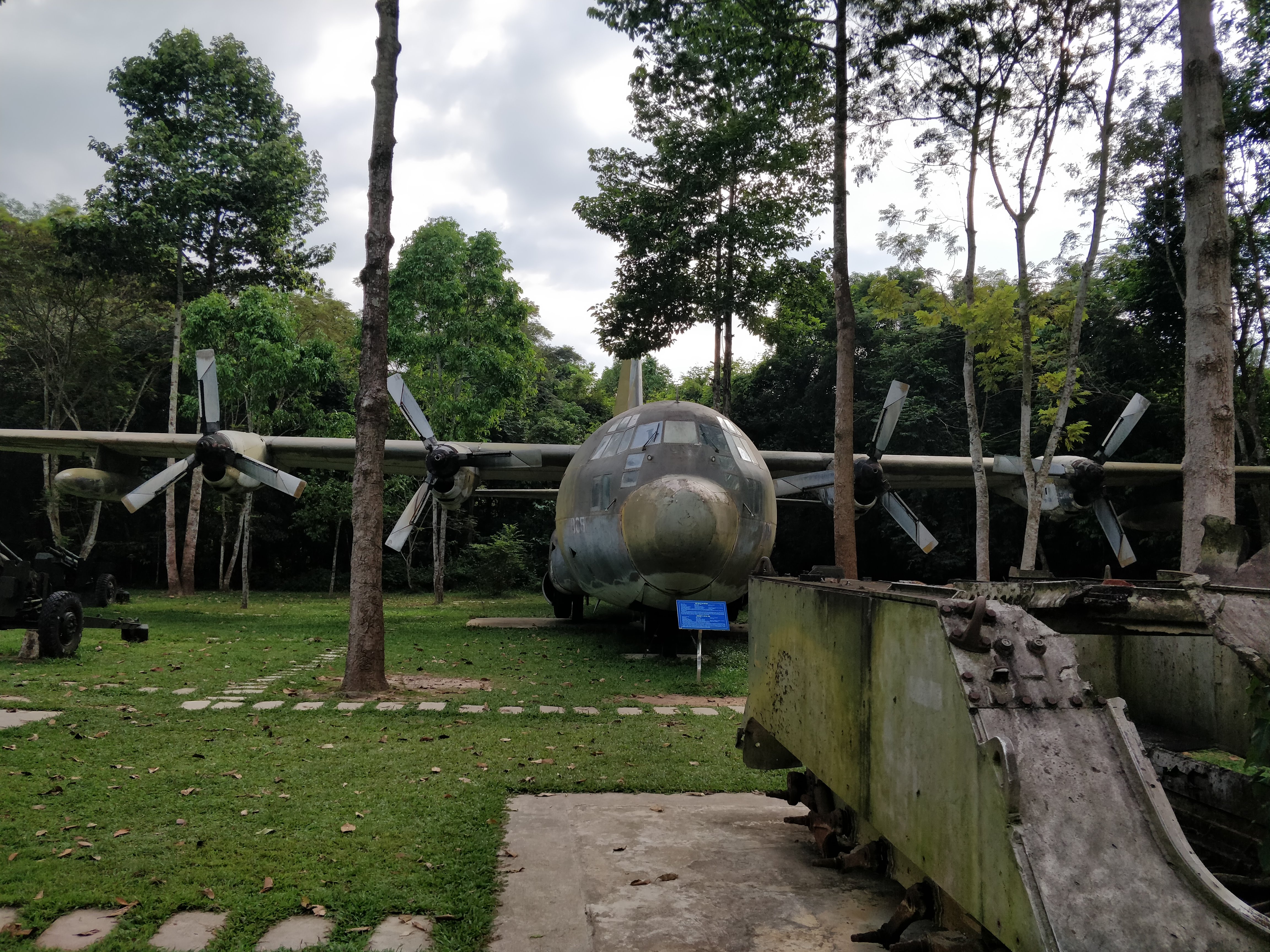 Abandoned planes, tanks and artillery on display outside the tunnels' entrance in Cu Chi tunnel
