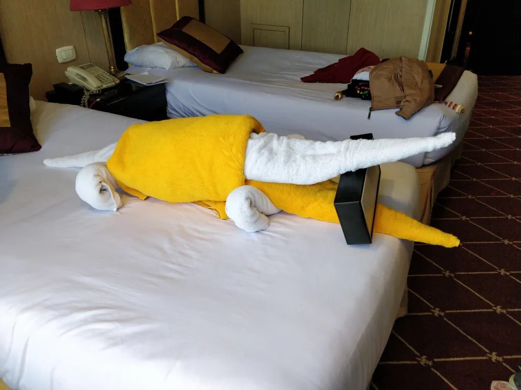 Bath towels arranged to form a crocodile