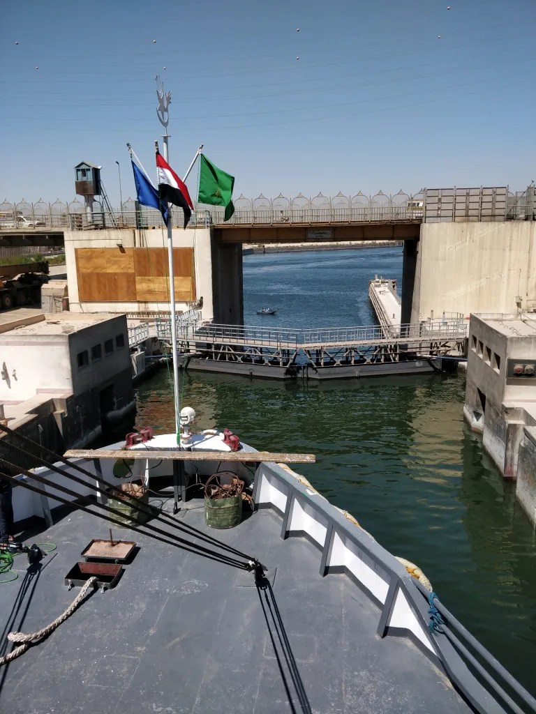 Esna lock on Nile river with boat height up
