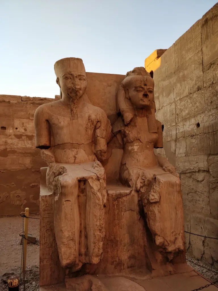A statue of Tutankhamun with his wife at Luxor temple