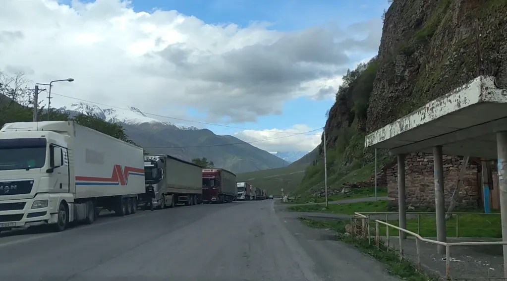 Trucks lining up along the highway, Georgian road trip