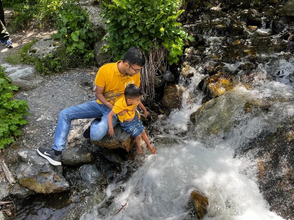 Playing in the stream and looking for shiny rocks in Gveleti