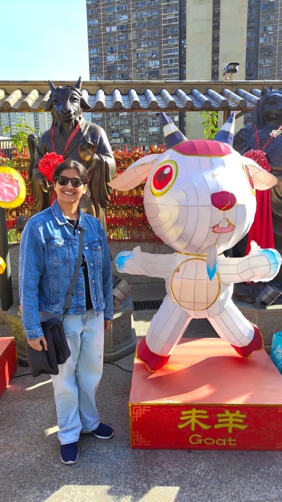 posing with zodiac animal - hong kong's culture