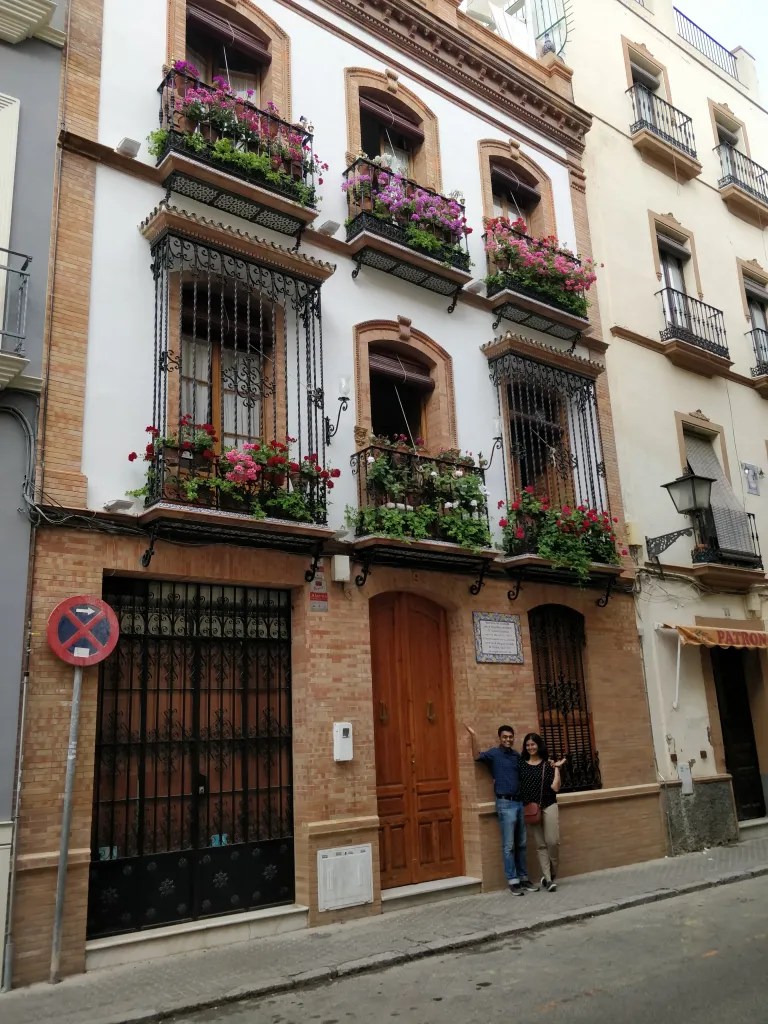 Posing with a house! in Seville