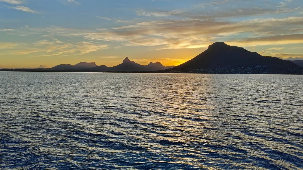 The sun rising behind us